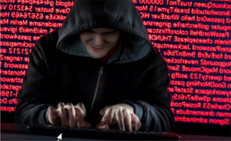 A man attempting to hack into accounts using a credential stuffing tool with usernames and passwords