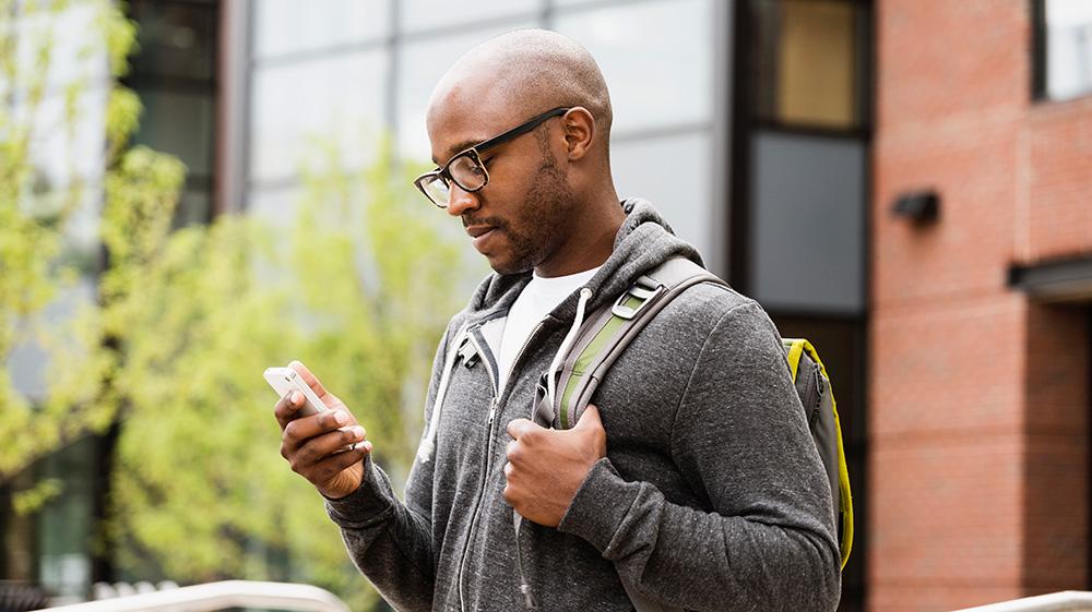 Man checking document safety on his smartphone.