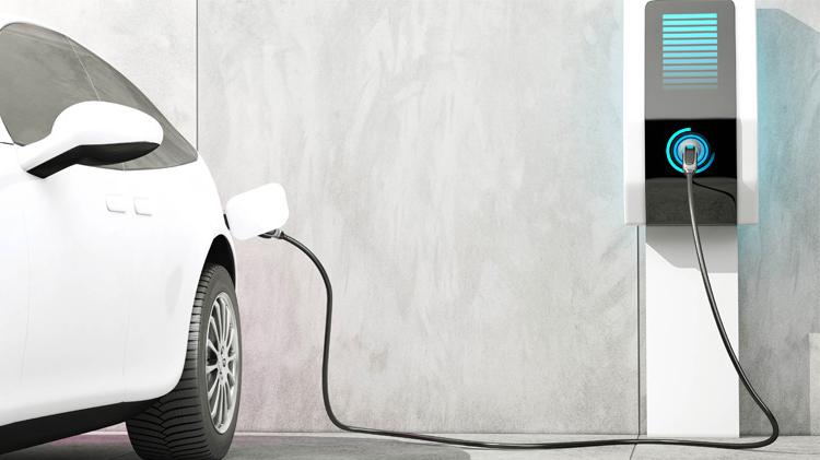 Charging a white electric car.